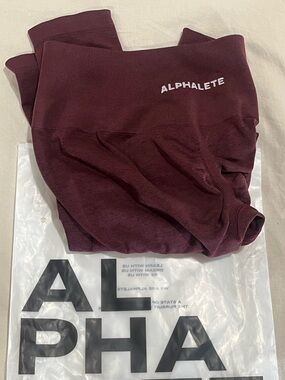 NEW Alphalete Plump Mid-Rise Waist Leggings - Burgundy/Merlot color in sizeLarge